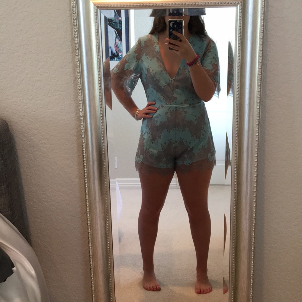 Voge Boutique deep V open back Romper SALE